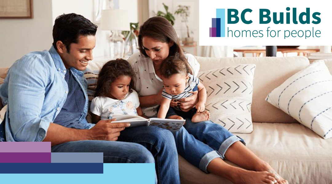 Family sitting together on a living room couch reading a book, with the BC Builds “homes for people” logo beside them.
