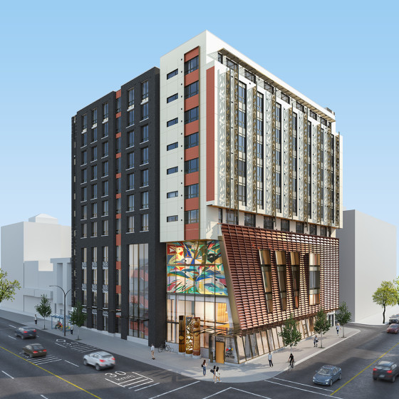 Rendering of a high-rise apartment building with unique architecture, stained glass windows, and multiple Indigenous-style artworks displayed on the exterior.