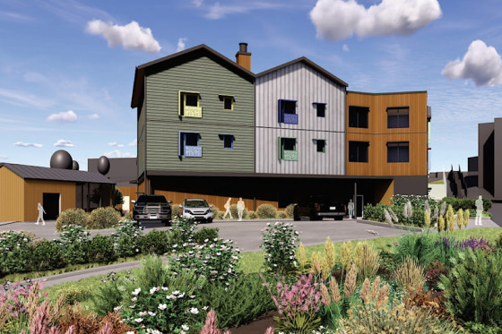 Rendering of a three-storey complex care housing building in Nanaimo with a mix of green, grey, and wood-tone siding.