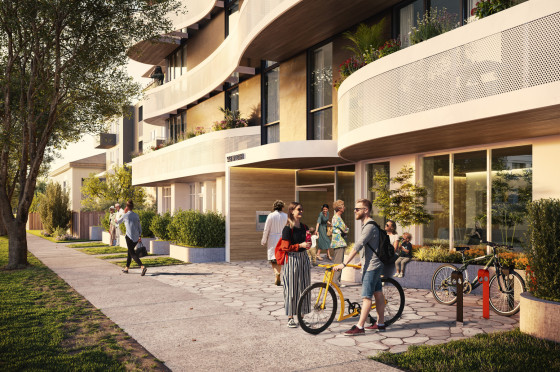 Rendering of entrance to a building with people walking and talking outside