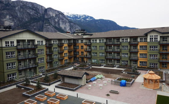 Exterior of The Westwinds seniors housing development, a modern five-storey building located at 38275 Third Avenue in Squamish.