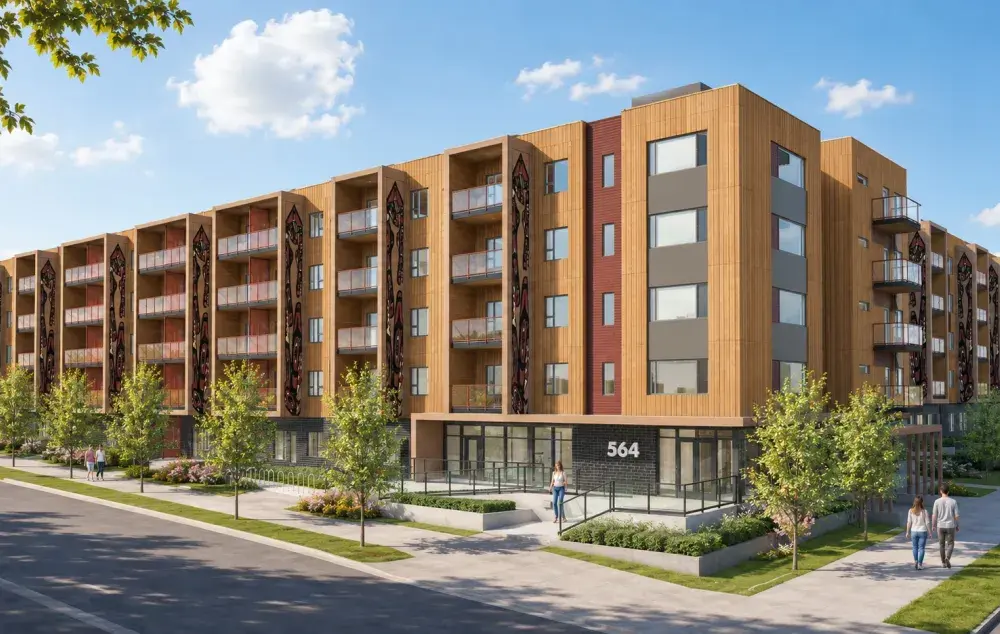 Rendering of a six-storey apartment building with balconies, Indigenous-inspired exterior artwork, landscaped grounds and an accessible entrance.